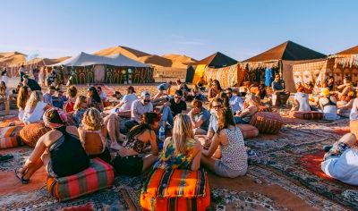 group of people in morocco sahara camp