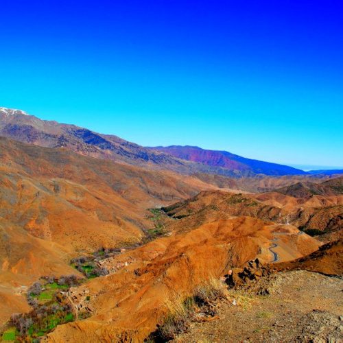 man-taking-photo-of-atals-mountains