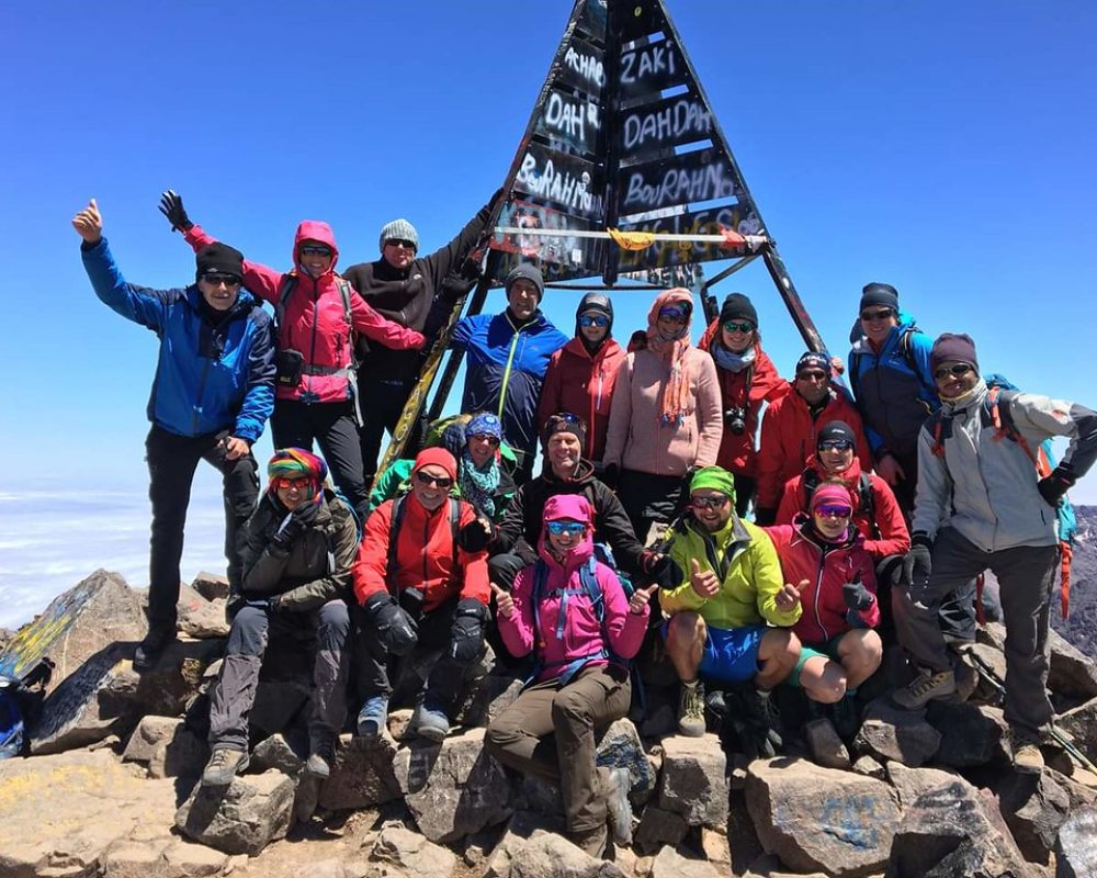 tourists in toubkal summit trek