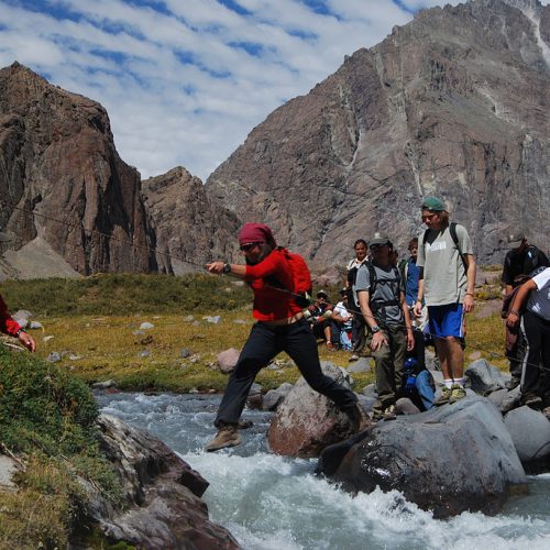 trekkers-crossing-a-river