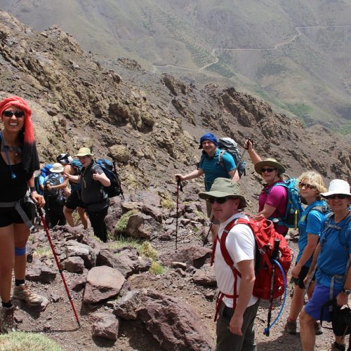 trekkers in atlas mountains